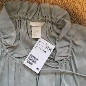 H&M Tops - H&M sleeveless high neck blouse, size 12 H&M Tops - H&M sleeveless high neck blouse, size 12